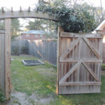 wood gate with arbor
